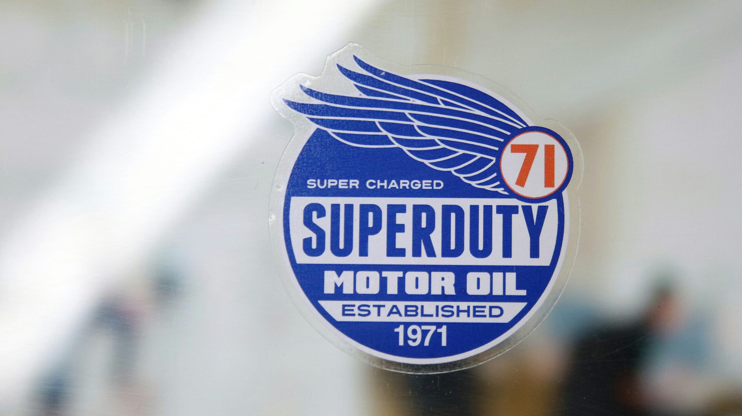 Superduty motor oil logo with wings and 71.